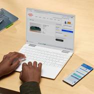 Laptop screen showing Best Buy welcome email coupon