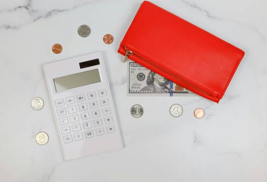 Canadian family using a coupon savings calculator and planning shopping for best value