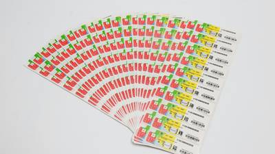 Organized coupon binder and digital expiry tracker for Canadian shoppers