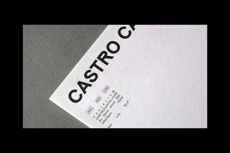 Costco customer at the service desk with a receipt, requesting a price adjustment