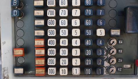 Canadian shopper using a digital coupon stacking calculator for groceries