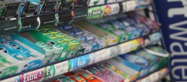 Canadian couponer stacking digital and printable coupons at a supermarket checkout