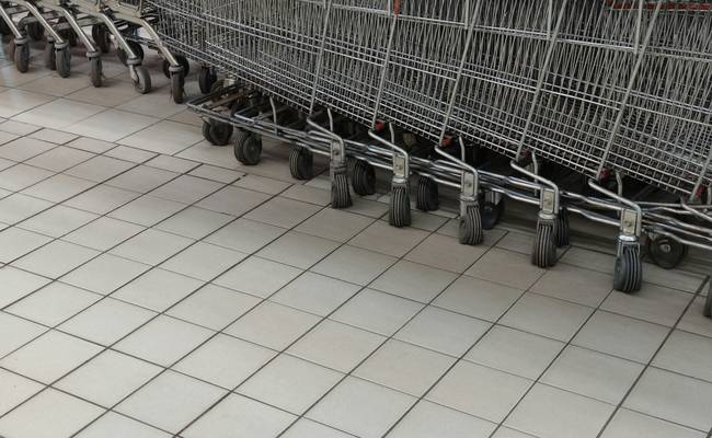 Canadian shopper looking frustrated at checkout, then relieved after coupon accepted