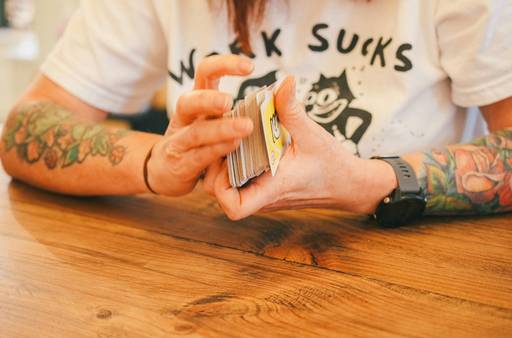 Canadian shopper stacking coupons and showing phone at No Frills checkout