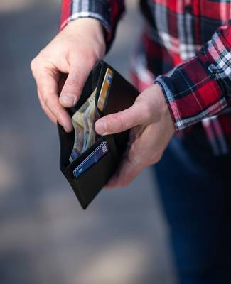 Canadian shopper tracking PC Optimum points and coupon savings on their phone