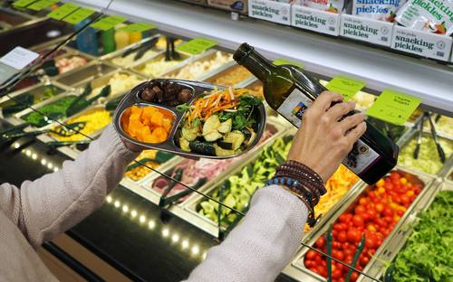 Save-On-Foods app showing digital coupons and Scene+ offers for Canadian grocery shopping