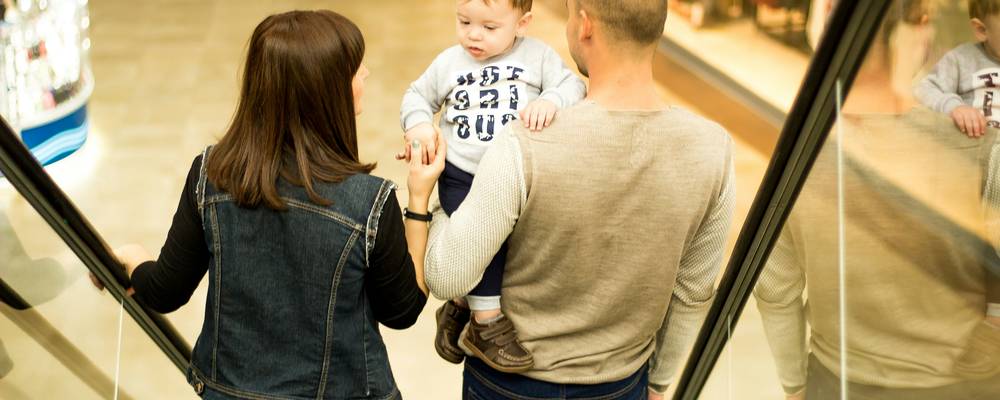Canadian family shopping at Sobeys using Scene+ card for rewards and savings