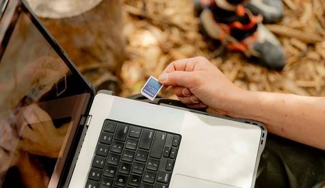 Canadian shopper redeeming a coupon and scanning PC Optimum card at Shoppers Drug Mart