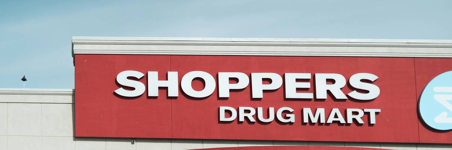 Shoppers Drug Mart aisle with promotional signage for PC Optimum points events