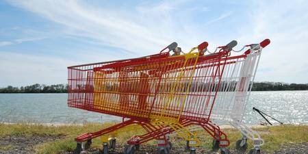 Shopping cart filled with discounted office supplies at Staples Canada